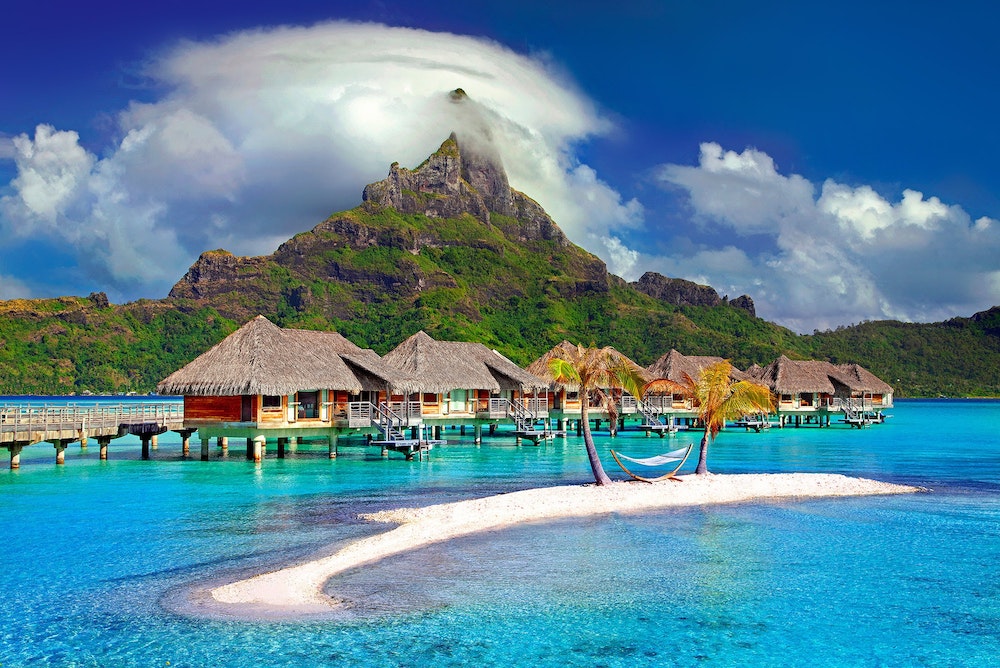 https://dlaignite.com/wp-content/uploads/2019/01/beach-bora-bora-clouds-753626.jpg