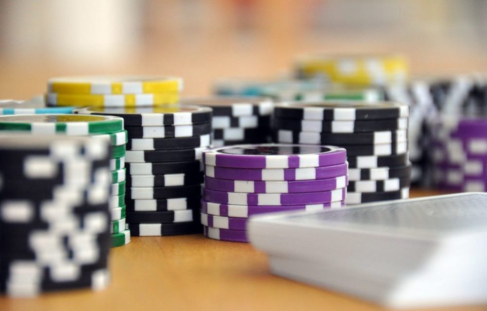 https://dlaignite.com/wp-content/uploads/2019/11/blue-green-and-purple-poker-chips-39856-scaled-e1573732385593-1000x640.jpg