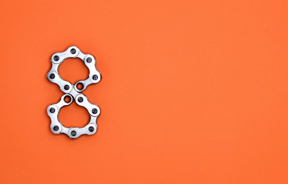 https://dlaignite.com/wp-content/uploads/2019/12/gray-motorcycle-chain-form-number-8-1061135-scaled-e1575287751795-1000x640.jpg
